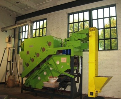 This machine cracks each cocoa seed into antioxidant-rich nib bits.