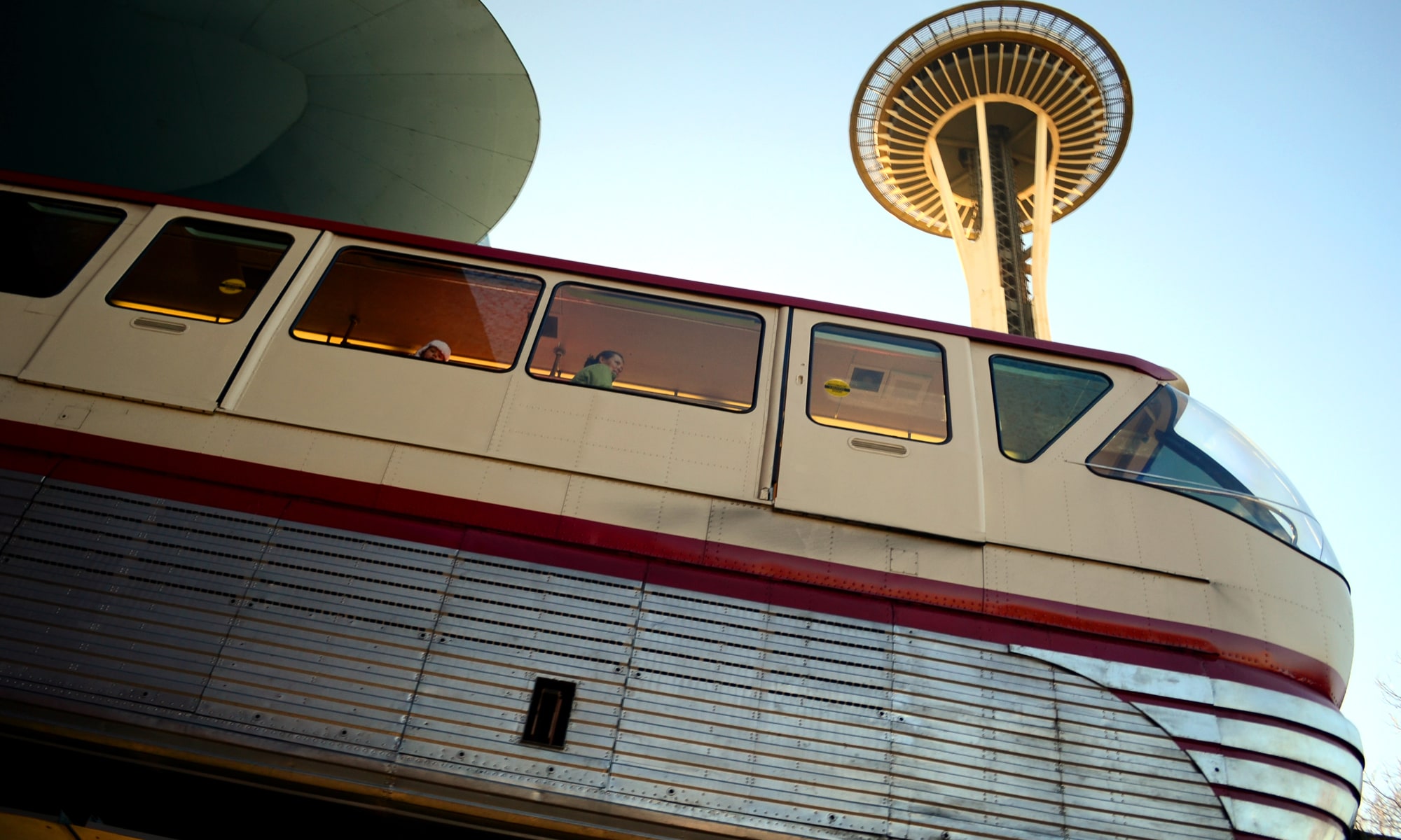 Seattle Monorail Passing Space Needle