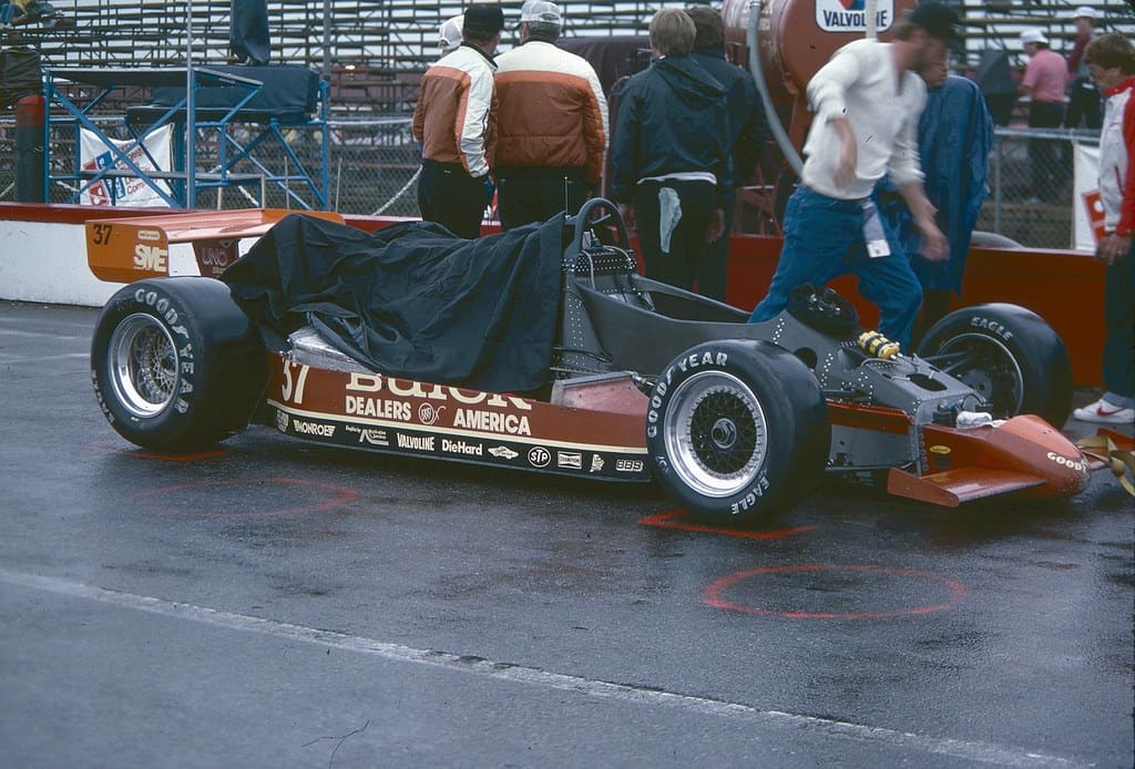 Race car photograph used for general motorsports context; not a portrait of Ludwig Heimrath Jr.